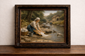 Laundress at the stream in daylight
